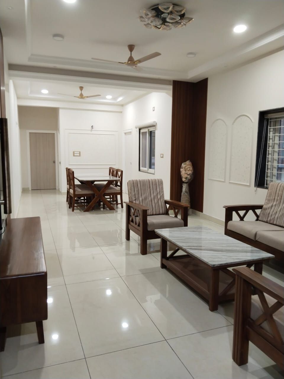 Open living and dining area in a Zuza Homes service apartment, Hyderabad